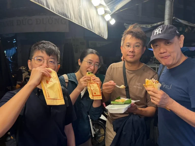 Saigon After Dark: Night Food Tour by Motorbike